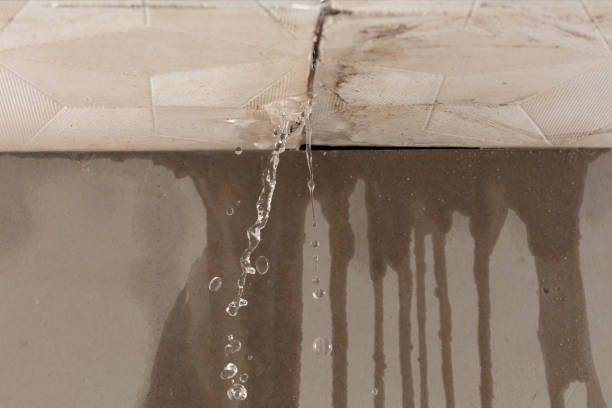 Professional Flood Damage Cleanup technician working in Brookton, ME